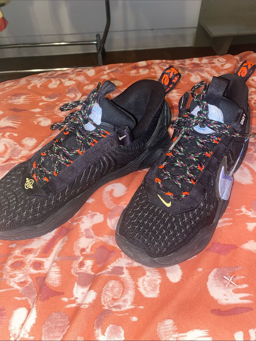 Nike Women’s Black Sneakers with Purple Swoosh and Multicolor Laces